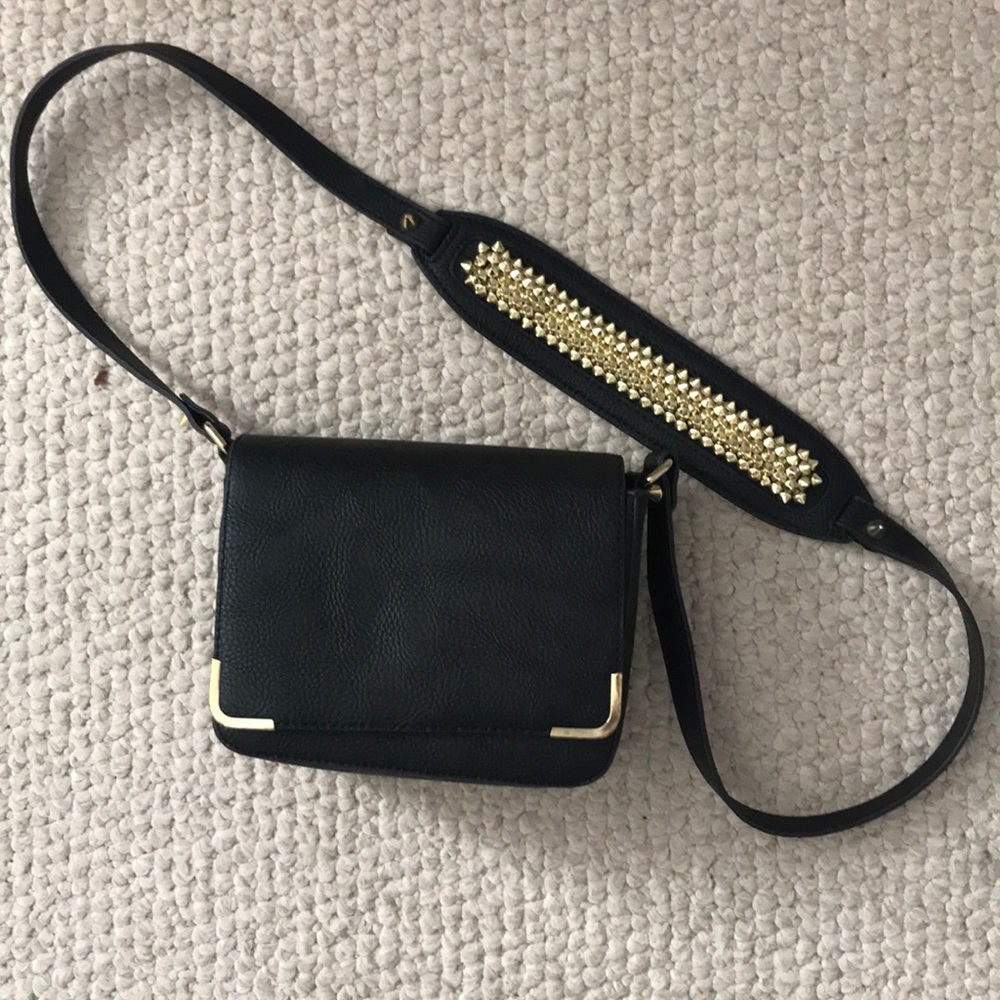Gold studded shoulder bag